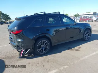 2025 Mazda CX-70 Premium Plus with VIN JM3KJEHA8S1100304, listed as a IAAI auction lot 42261867 with 2,678 mi miles and . Bid and sale history available at DreamBid. Image 4.