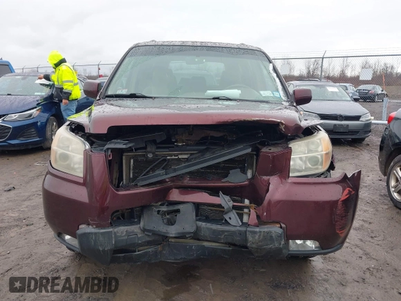 2007 Honda Pilot EX-L with VIN 2HKYF18557H535426, listed as a IAAI auction lot 41126160 with 169,336 mi miles. Bid and sale history available at carsss.com. Image 12.