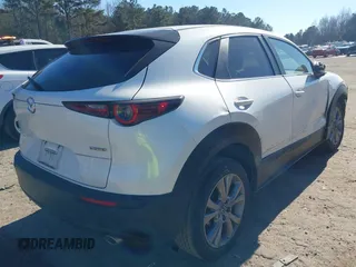2021 Mazda CX-30 Select with VIN 3MVDMABL3MM239692, listed as a IAAI auction lot 41354738 with 48,928 mi miles and . Bid and sale history available at DreamBid. Image 4.