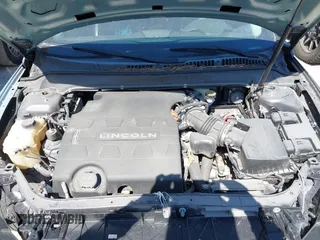 2014 Lincoln MKZ with VIN 3LN6L2GK9ER818561, listed as a IAAI auction lot 42063387 with 143,803 mi miles. Bid and sale history available at carsss.com. Image 10.