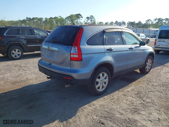 2007 Honda CR-V EX with VIN JHLRE385X7C018690, listed as a IAAI auction lot 42071383 with 198,775 mi miles. Bid and sale history available at carsss.com. Image 4.