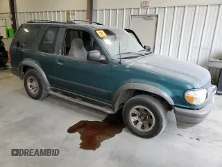 1998 Ford Explorer Sport with VIN 1FMYU22X4WUB36948, listed as a Copart auction lot 76699374 with 266,977 mi miles and Salvage title. Bid and sale history available at DreamBid. Image 4.