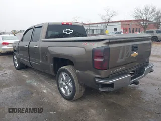 2015 Chevrolet Silverado 1500 LT with VIN 1GCVKREC9FZ237338, listed as a IAAI auction lot 41897225 with 154,229 mi miles and . Bid and sale history available at DreamBid. Image 3.