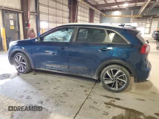 2019 Kia Niro Touring with VIN KNDCE3LC3K5233334, listed as a Copart auction lot 50331415 with 121,827 mi miles and Salvage Title. Bid and sale history available at carsss.com. Image 2.