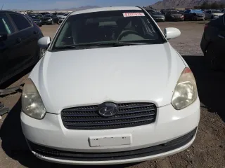 2007 Hyundai Accent GLS with VIN KMHCN46C97U119199, listed as a Copart auction lot 87337414 with 151,070 mi miles and Salvage Title. Bid and sale history available at carsss.com. Image 5.