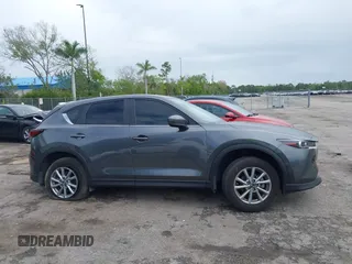2023 Mazda CX-5 2.5 S Select Package with VIN JM3KFBBM3P0289296, listed as a IAAI auction lot 41676427 with 15,709 mi miles. Bid and sale history available at carsss.com. Image 13.