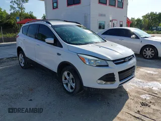 2013 Ford Escape SE with VIN 1FMCU0GX1DUB71466, listed as a IAAI auction lot 42329136 with 103,763 mi miles and . Bid and sale history available at DreamBid. Image 1.