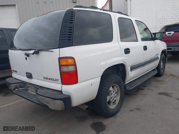 2003 Chevrolet Tahoe Z71 with VIN 1GNEK13T03R247814, listed as a IAAI auction lot 41026670 with 143,990 mi miles. Bid and sale history available at carsss.com. Image 4.