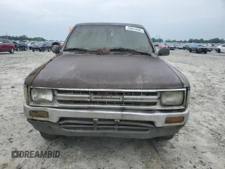 1989 Toyota Pickup DLX z VIN JT4RN93P5K0008068, wystawiony jako Copart lot #58843695 z przebiegiem 285 895 mil mil oraz Tytuł czysty. Historia ofert i sprzedaży dostępna na DreamBid. Obrazek 5.