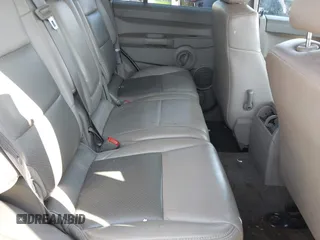 2007 Jeep Commander Sport z VIN 1J8HG48K07C559271, wystawiony jako IAAI lot #42032853 z przebiegiem 236 443 mil mil oraz . Historia ofert i sprzedaży dostępna na DreamBid. Obrazek 8.