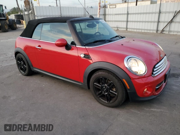 2015 MINI Convertible with VIN WMWZN3C59FT862963, listed as a Copart auction lot 86016514 with 96,493 mi miles and Salvage title. Bid and sale history available at DreamBid. Image 4.