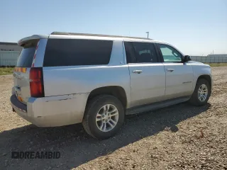 2020 Chevrolet Suburban LT z VIN 1GNSKHKC0LR285945, wystawiony jako Copart lot #56207225 z przebiegiem 208 281 mil mil oraz Czysty tytuł • Clean title. Historia ofert i sprzedaży dostępna na DreamBid. Obrazek 3.