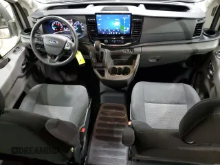 2023 Ford Transit Passenger XL with VIN 1FBAX2C86PKB28288, listed as a Copart auction lot 77303204 with 31,380 mi miles and Clean Title. Bid and sale history available at carsss.com. Image 8.