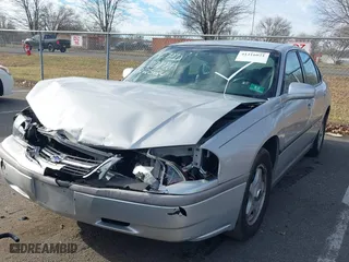 2003 Chevrolet Impala with VIN 2G1WF52E639136361, listed as a IAAI auction lot 41216021 with 135,055 mi miles. Bid and sale history available at carsss.com. Image 6.