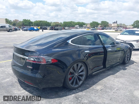 2017 Tesla Model S 100D with VIN 5YJSA1E47HF185734, listed as a IAAI auction lot 42076544 with 56,682 mi miles. Bid and sale history available at carsss.com. Image 4.