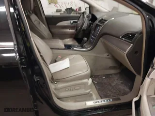 2011 Lincoln MKX with VIN 2LMDJ8JK9BBJ33290, listed as a IAAI auction lot 41819376 with 153,231 mi miles. Bid and sale history available at carsss.com. Image 5.