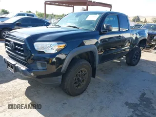 2020 Toyota Tacoma SR z VIN 3TYRZ5CN7LT000455, wystawiony jako IAAI lot #42313072 z przebiegiem 43 815 mil mil oraz . Historia ofert i sprzedaży dostępna na DreamBid. Obrazek 17.