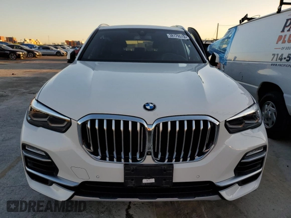 2020 BMW X5 sDrive40i with VIN 5UXCR4C03L9B14243, listed as a Copart auction lot 38179513 with 0 mi miles. Bid and sale history available at carsss.com. Image 5.