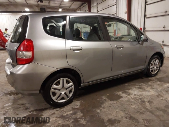 2007 Honda Fit with VIN JHMGD38417S045716, listed as a IAAI auction lot 42340897 with 63,765 mi miles and . Bid and sale history available at DreamBid. Image 4.
