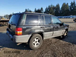1998 Jeep Grand Cherokee Laredo with VIN 1J4GZ58S0WC106148, listed as a Copart auction lot 42855105 with 263,785 mi miles and Salvage Title. Bid and sale history available at carsss.com. Image 3.