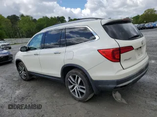 2017 Honda Pilot Touring with VIN 5FNYF6H91HB092062, listed as a Copart auction lot 52761765 with 141,750 mi miles and Salvage Title. Bid and sale history available at DreamBid. Image 2.
