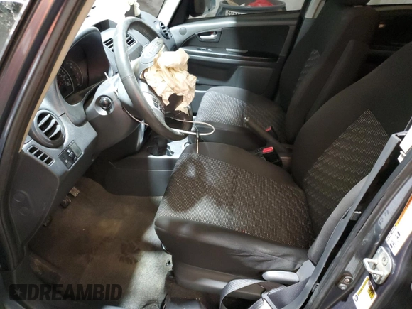 2009 Suzuki SX4 Man AWD with VIN JS2YB413496201977, listed as a Copart auction lot 84171644 with 136,908 mi miles and Salvage Title. Bid and sale history available at carsss.com. Image 7.