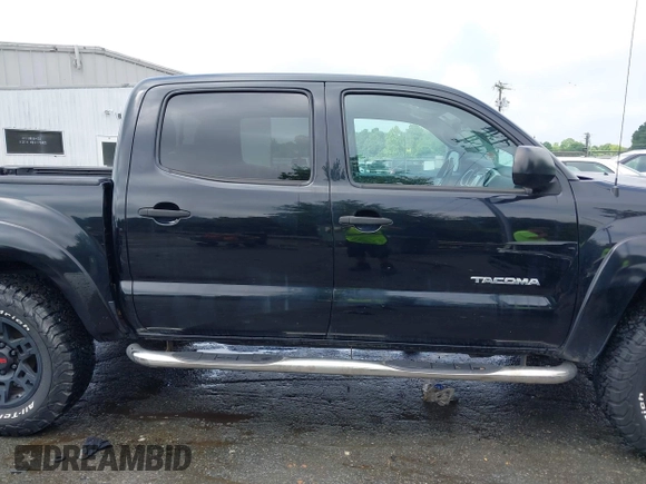 2014 Toyota Tacoma with VIN 5TFLU4EN5EX101434, listed as a IAAI auction lot 42273927 with 216,394 mi miles and . Bid and sale history available at DreamBid. Image 13.