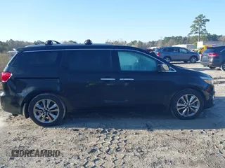 2015 Kia Sedona SX-L with VIN KNDME5C16F6037693, listed as a IAAI auction lot 41779327 with 149,552 mi miles and . Bid and sale history available at DreamBid. Image 13.