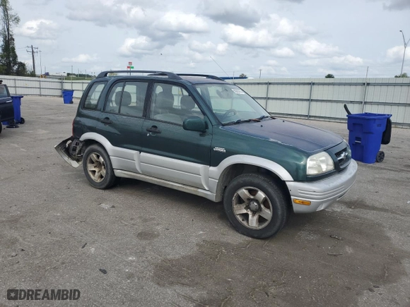 1999 Suzuki Grand Vitara LX with VIN JS3TD62V0X4124366, listed as a Copart auction lot 50885055 with 204,168 mi miles and Salvage Title. Bid and sale history available at carsss.com. Image 4.