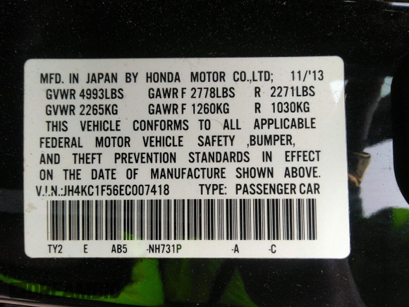 2014 Acura RLX Tech Pkg with VIN JH4KC1F56EC007418, listed as a IAAI auction lot 41790185 with 130,288 mi miles. Bid and sale history available at carsss.com. Image 9.