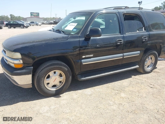 2003 Chevrolet Tahoe LT with VIN 1GNEC13Z03R318933, listed as a IAAI auction lot 41828148 with 192,851 mi miles. Bid and sale history available at carsss.com. Image 2.