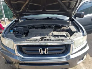 2011 Honda Ridgeline RT z VIN 5FPYK1F26BB453191, wystawiony jako IAAI lot #41776280 z przebiegiem 122 908 mil mil oraz . Historia ofert i sprzedaży dostępna na DreamBid. Obrazek 10.