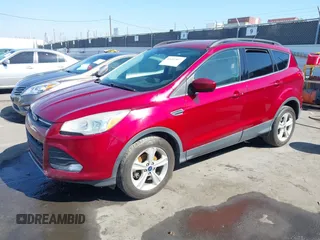 2015 Ford Escape SE with VIN 1FMCU0GX3FUC80207, listed as a IAAI auction lot 41665897 with 153,891 mi miles. Bid and sale history available at carsss.com. Image 2.