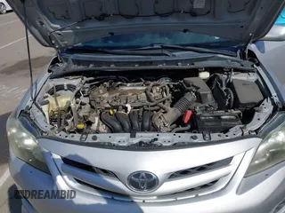 2012 Toyota Corolla L with VIN 2T1BU4EEXCC866050, listed as a IAAI auction lot 42140147 with 212,814 mi miles. Bid and sale history available at carsss.com. Image 10.