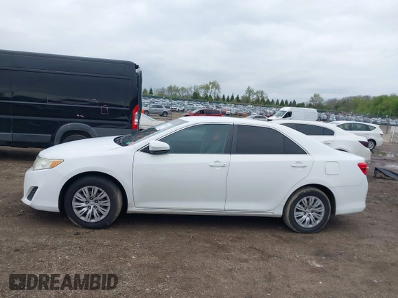 2012 Toyota Camry L z VIN 4T1BF1FKXCU525596, wystawiony jako IAAI lot #42076132 z przebiegiem 197 164 mil mil oraz . Historia ofert i sprzedaży dostępna na DreamBid. Obrazek 14.