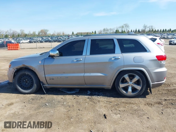 2014 Jeep Grand Cherokee Overland with VIN 1C4RJFCT9EC231840, listed as a IAAI auction lot 42114284 with 170,691 mi miles and . Bid and sale history available at DreamBid. Image 14.