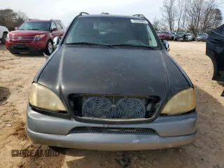 1999 Mercedes-Benz M 320/430/500 z VIN 4JGAB54E0XA060572, wystawiony jako Copart lot #45536805 z przebiegiem 215 210 mil mil oraz Szkoda całkowita • Salvage title. Historia ofert i sprzedaży dostępna na DreamBid. Obrazek 5.