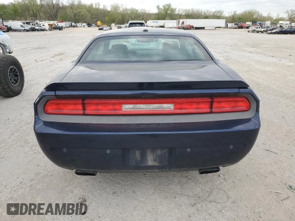 2013 Dodge Challenger R/T z VIN 2C3CDYBT9DH585965, wystawiony jako Copart lot #52995875 z przebiegiem 131 456 mil mil oraz Szkoda całkowita • Salvage title. Historia ofert i sprzedaży dostępna na DreamBid. Obrazek 6.