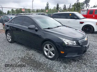 2014 Chevrolet Cruze 2LT z VIN 1G1PE5SB1E7392067, wystawiony jako IAAI lot #42269484 z przebiegiem 79 309 mil mil oraz . Historia ofert i sprzedaży dostępna na DreamBid. Obrazek 1.