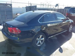2015 Volkswagen Passat 1.8T S with VIN 1VWAT7A38FC078348, listed as a IAAI auction lot 41847952 with 135,530 mi miles. Bid and sale history available at carsss.com. Image 4.