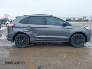 2023 Ford Edge SE z VIN 2FMPK4G95PBA41278, wystawiony jako IAAI lot #41964995 z przebiegiem 21 079 mil mil oraz . Historia ofert i sprzedaży dostępna na DreamBid. Obrazek 13.