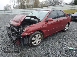 2009 Kia Spectra SX with VIN KNAFE221895648213, listed as a Copart auction lot 85082664 with 241,644 mi miles and Salvage Title. Bid and sale history available at carsss.com. Image 1.