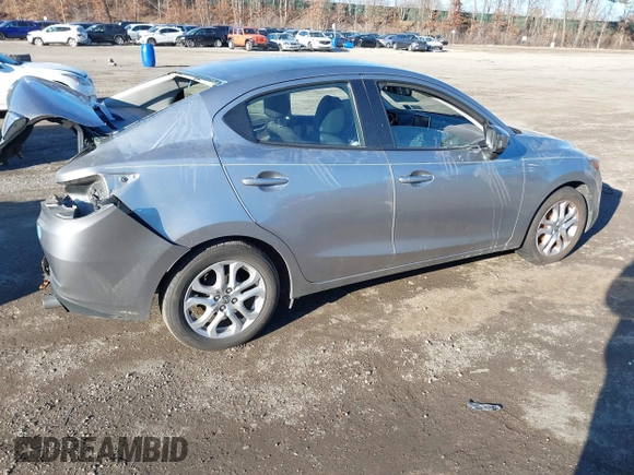 2016 Scion iA with VIN 3MYDLBZV5GY129856, listed as a IAAI auction lot 41624817 with 69,686 mi miles. Bid and sale history available at carsss.com. Image 4.