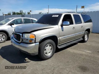 2001 GMC Yukon XL SLE with VIN 1GKFK16T41J247338, listed as a Copart auction lot 70948734 with Not Provided miles and Salvage Title. Bid and sale history available at carsss.com. Image 1.