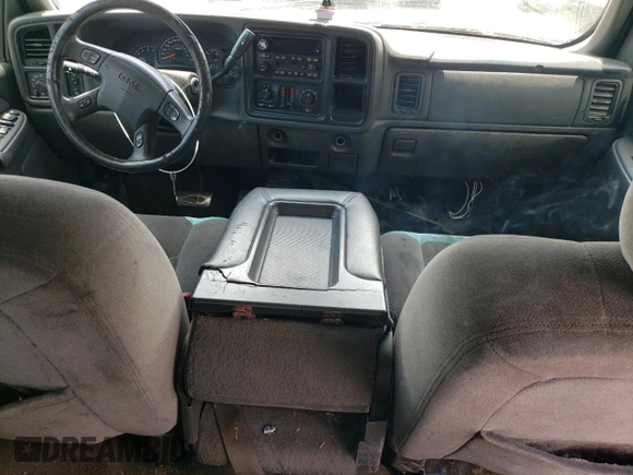 2003 GMC Sierra 1500HD SLE z VIN 1GTGC13U73F105405, wystawiony jako Copart lot #76817714 z przebiegiem 213 665 mil mil oraz Szkody całkowita. Historia ofert i sprzedaży dostępna na DreamBid. Obrazek 8.