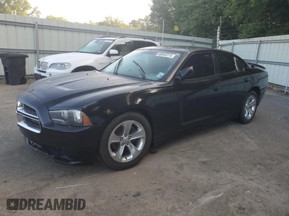 2013 Dodge Charger SE with VIN 2C3CDXBG9DH512172, listed as a Copart auction lot 60943214 with 125,163 mi miles and Salvage Title. Bid and sale history available at DreamBid. Image 1.