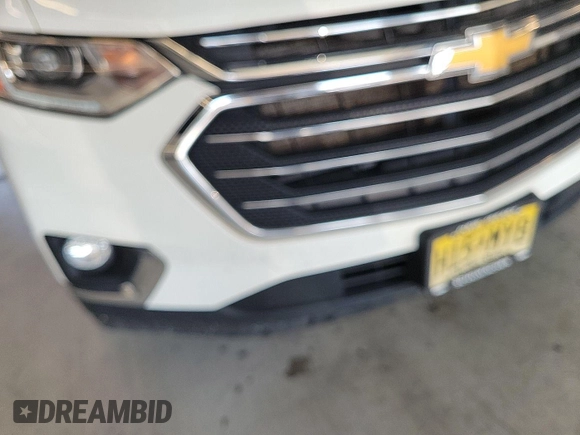 2020 Chevrolet Traverse LT Cloth z VIN 1GNEVMKW4LJ292564, wystawiony jako IAAI lot #42866891 z przebiegiem 72 750 mil mil oraz . Historia ofert i sprzedaży dostępna na DreamBid. Obrazek 23.