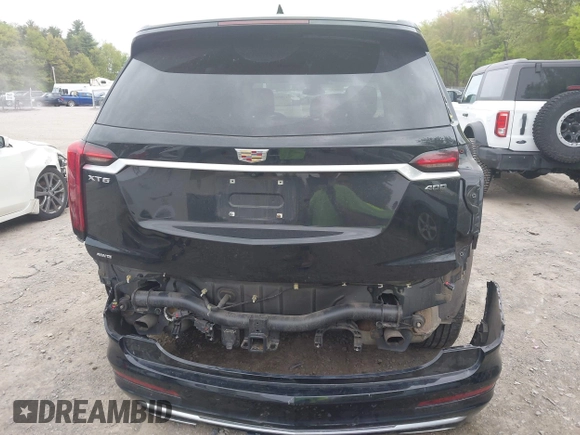2022 Cadillac XT6 Premium Luxury with VIN 1GYKPDRS5NZ149971, listed as a IAAI auction lot 42259140 with 51,704 mi miles and . Bid and sale history available at DreamBid. Image 16.
