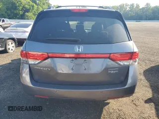 2014 Honda Odyssey Touring with VIN 5FNRL5H94EB116891, listed as a Copart auction lot 61400725 with 202,972 mi miles and Salvage title. Bid and sale history available at DreamBid. Image 6.