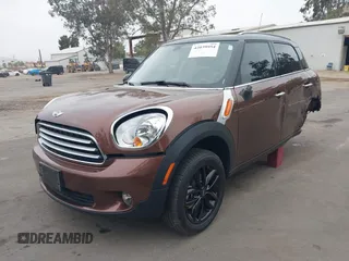 2013 MINI Countryman with VIN WMWZB3C56DWM09484, listed as a IAAI auction lot 42039954 with 37,264 mi miles and . Bid and sale history available at DreamBid. Image 2.